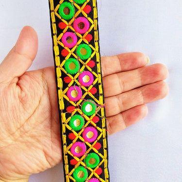 Black Cotton Fabric Mirrored Trim With Embroidery In Fuchsia Pink, Green, Red & Yellow Threads